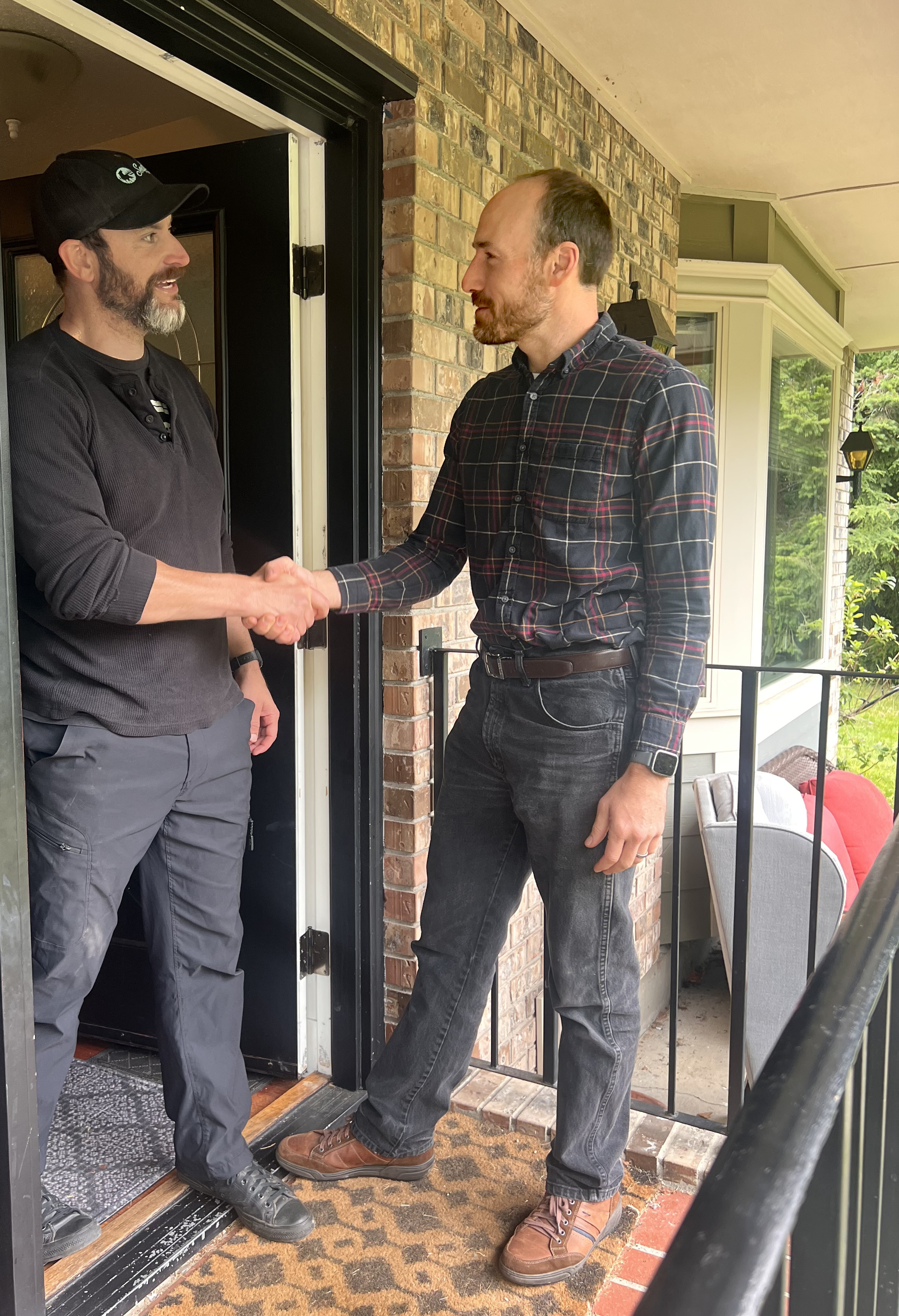 Neil MacEachern meeting constituent on campaign trail in Gibsons, British Columbia
